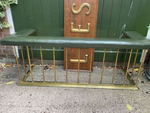 fig 1. Early C20th Edwardian period polished brass and leather seated ‘club’ fender of restrained design.
