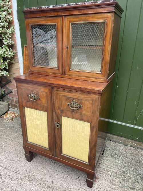 fig 3. Elegant early C19th small-scale mahogany 4 door 2-part glazed cabinet having brass line inlay and brass mouldings , together with a ‘rosso levanto’ marble top.