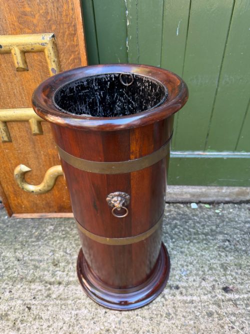 fig 1. Mid C19th brass-bound mahogany cylindrical stick and umbrella stand .