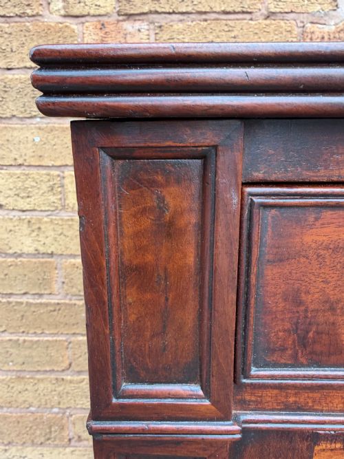 fig 2. An early nineteenth-century George III mahogany low bookcase featuring two top frieze drawers over glazed twin doors and turned feet.