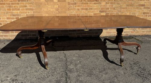 An Elegant Early C19th Late George III Period Twin-pillar Mahogany Dining Table of Versatile Form and Practical Scale.
