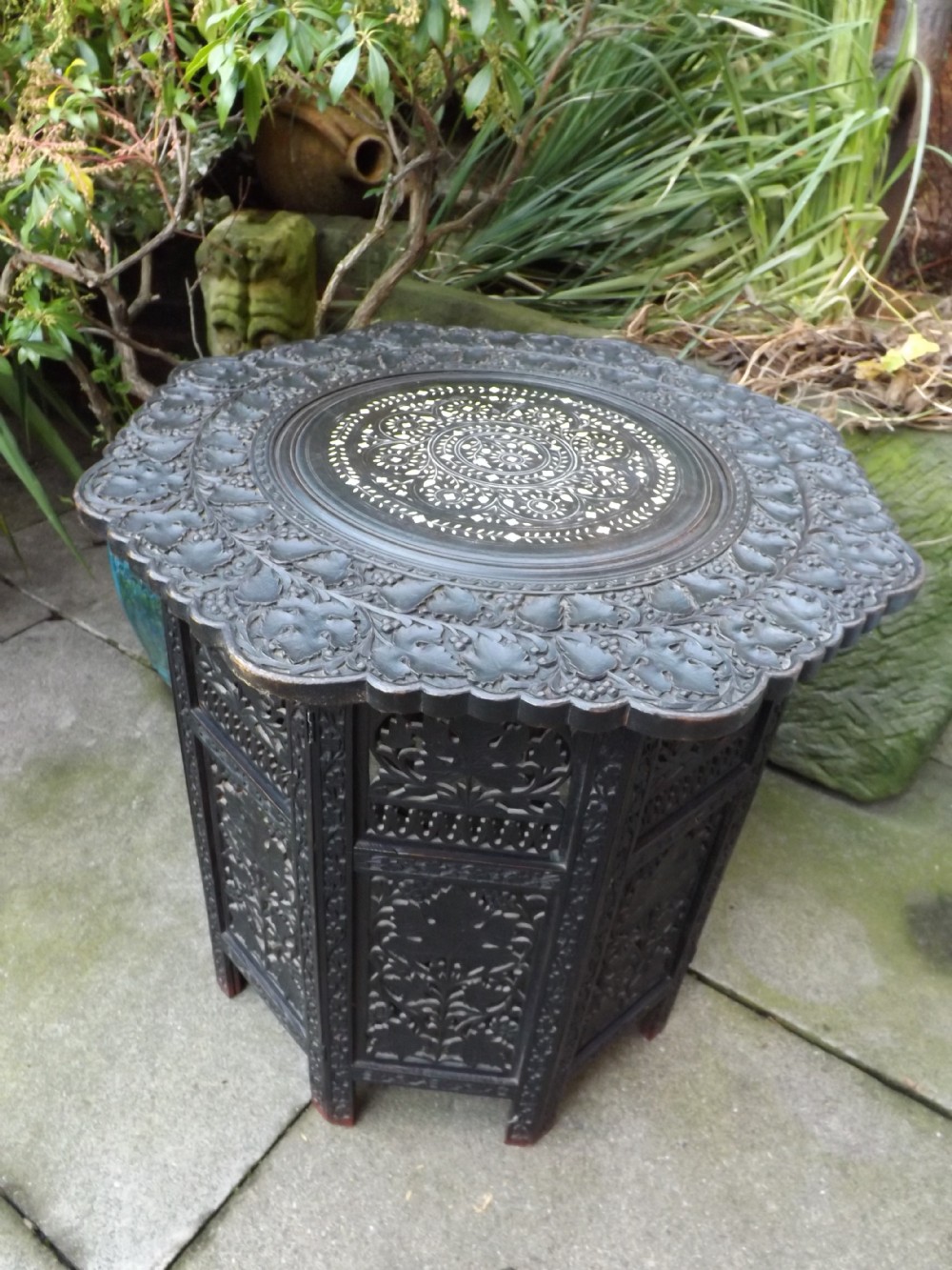 C19th Anglo- Indian ebonised octagonal table with ivory-inlaid top.