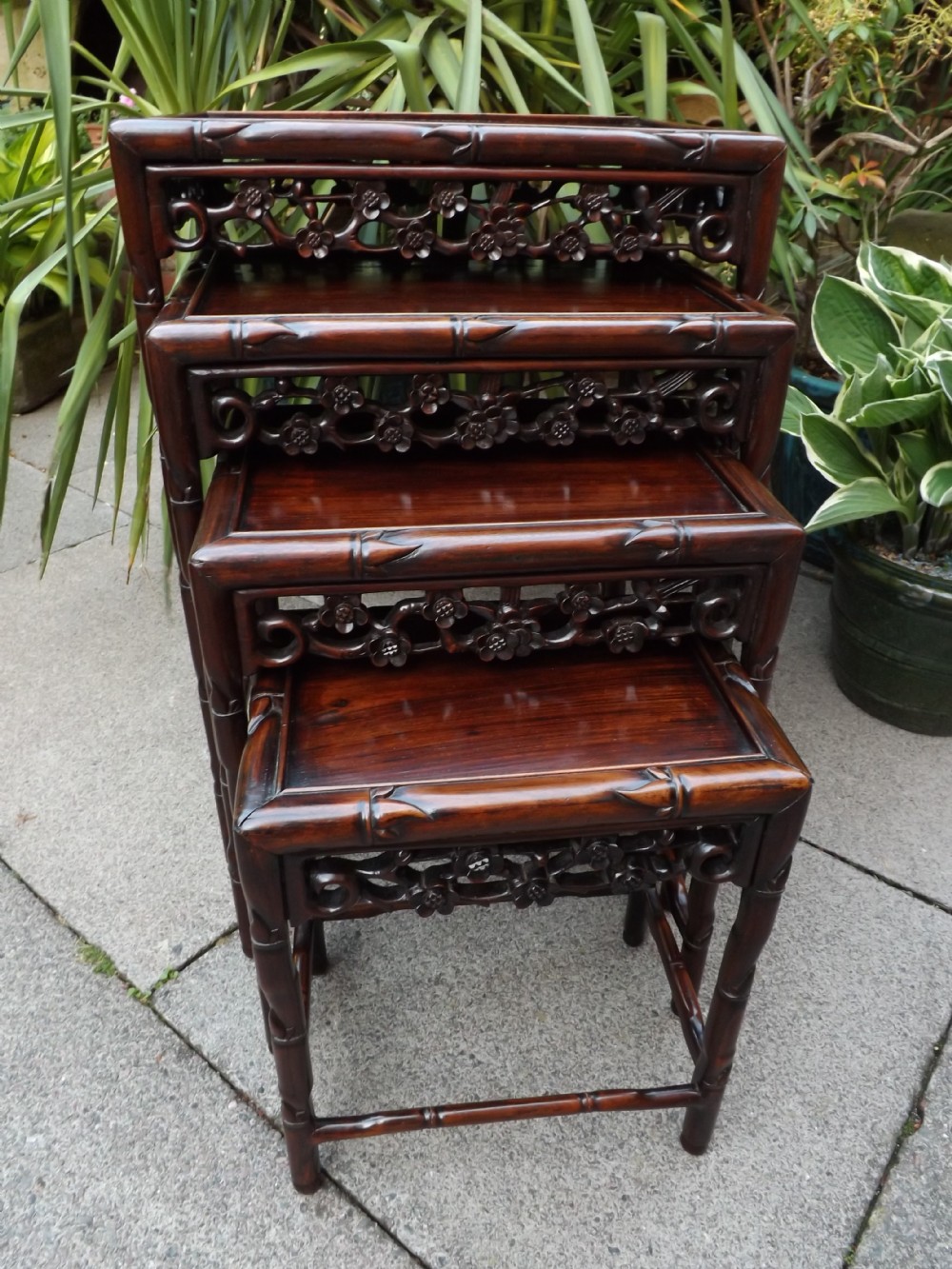 Late C19th graduated 'nest' or quartetto of Chinese hardwood tables.