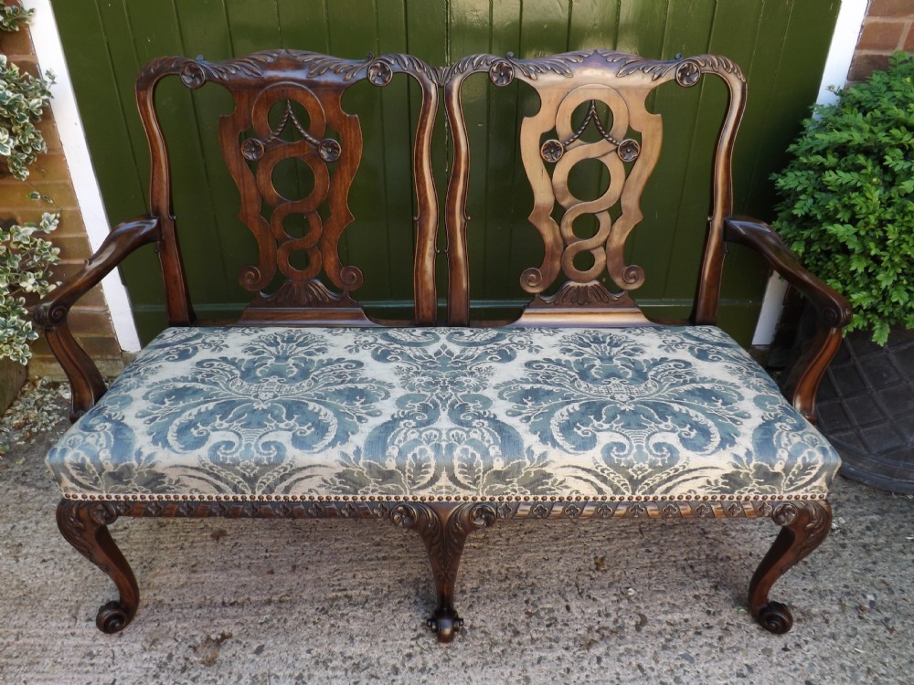 Early C20th George II period style mahogany double chair-back settee.