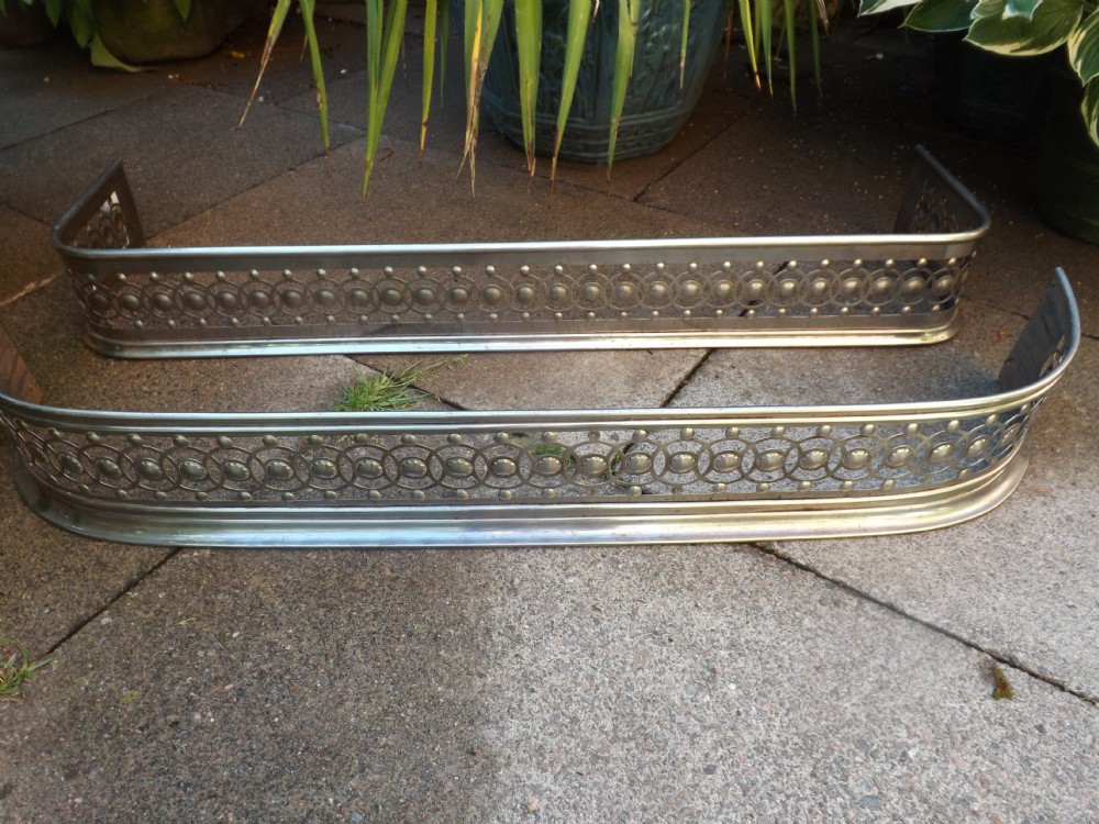 x 2 Early C19th Regency period steel fire-place fenders of identical pattern.