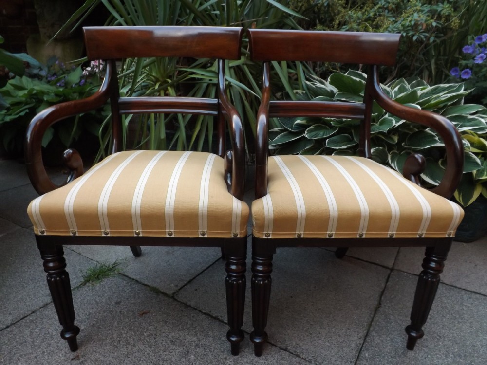 Pair of early C19th Regency mahogany armchairs.