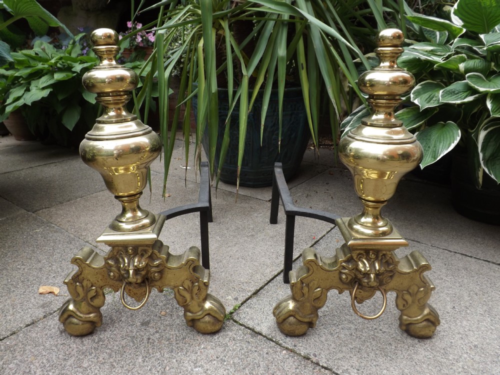 Pair of C17th-style brass fire-place andirons or 'fire-dogs'.