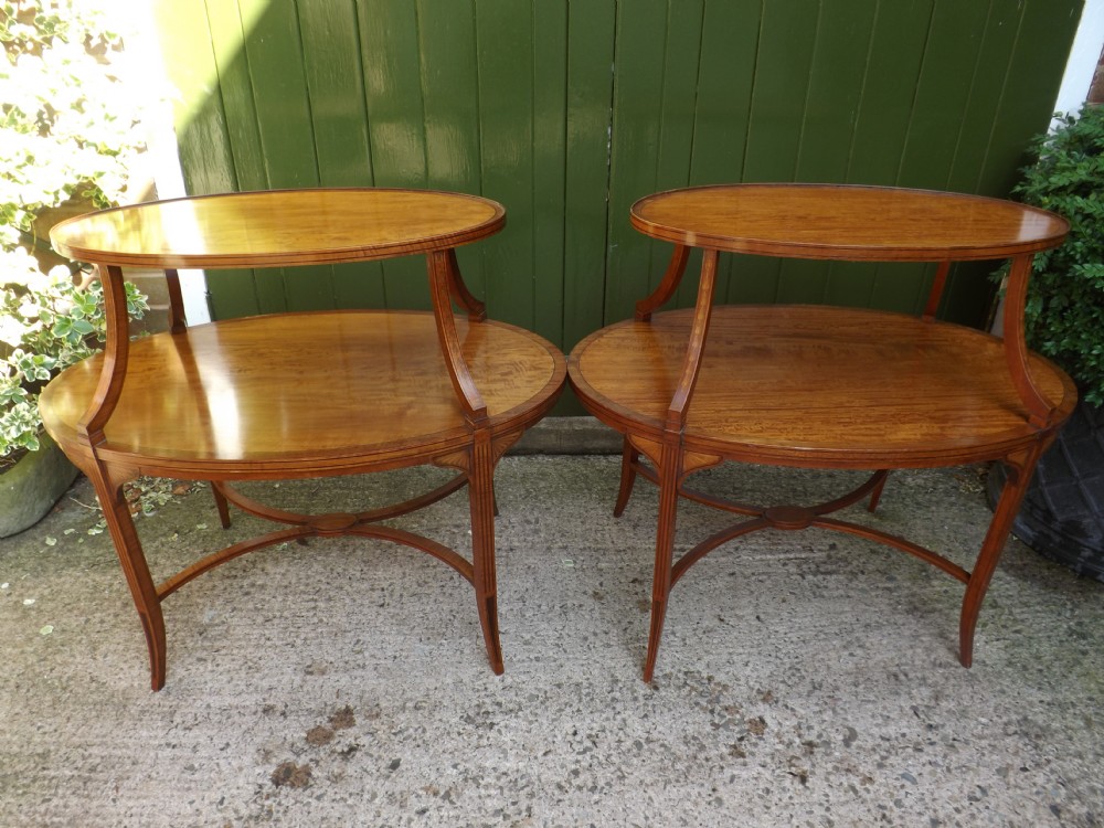 Matched pair of late C19th Edwardian period inlaid satinwood oval 2-tier etageres.