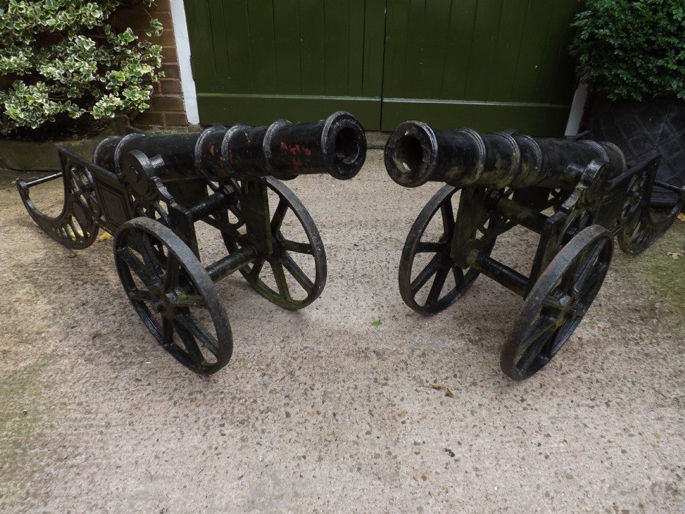 Pair of early C20th ornamental cast-iron cannon
