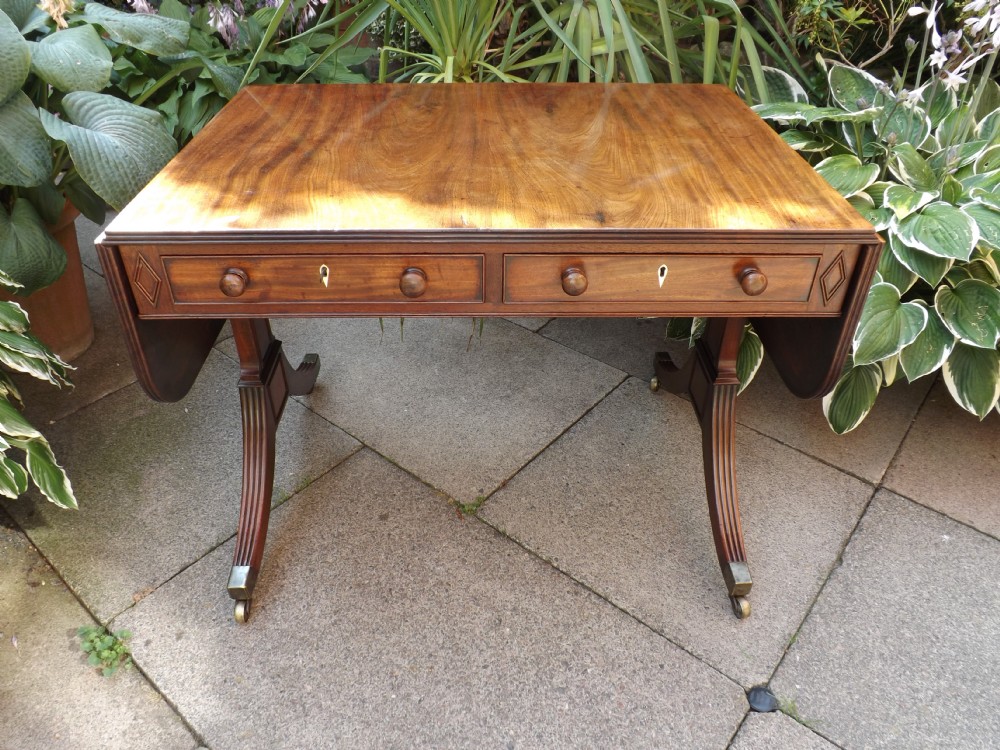 Early C19th late George III period mahogany sofa table.
