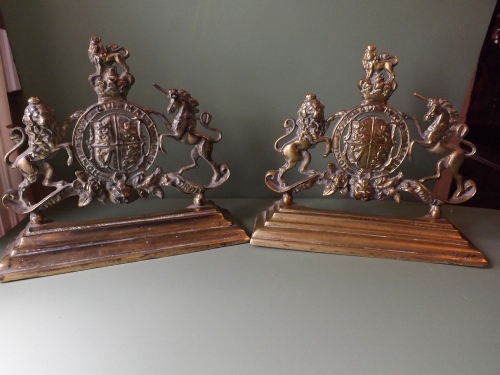 Pair of C19th cast-brass Royal-Coat-of-Arms armorial door-stops. 