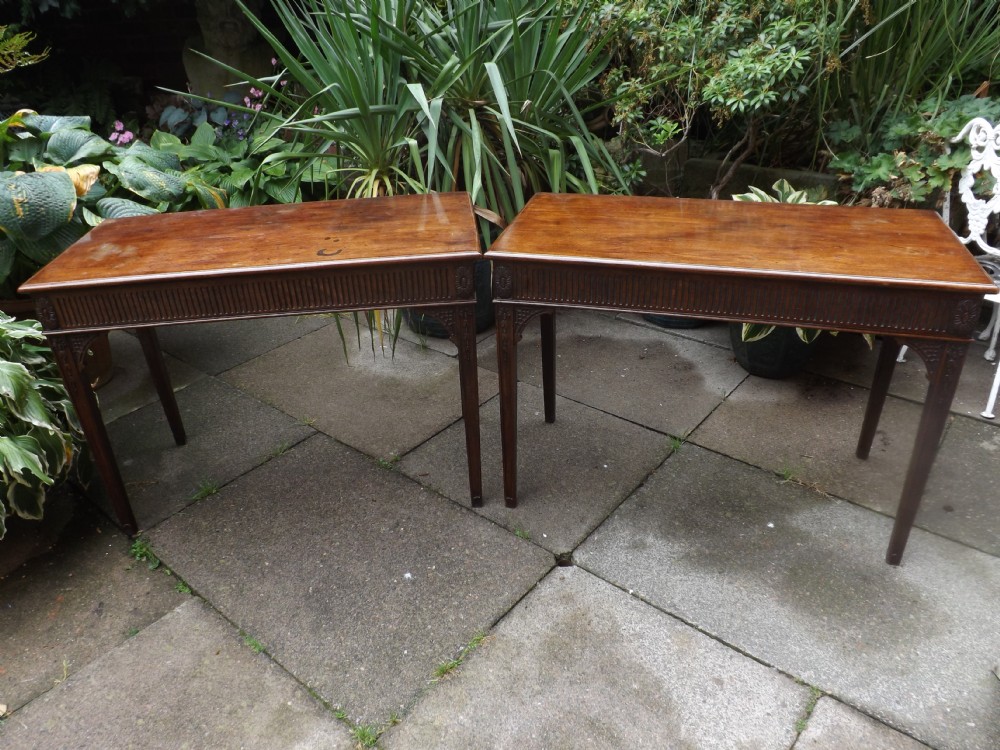 Pair of C19th mahogany pier or side tables in the style of Robert Adam.