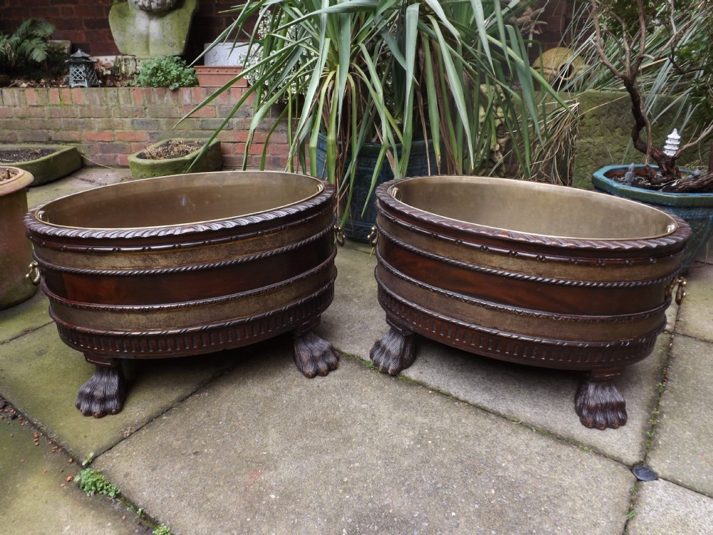 Pair of early C20th George II design period-style  brass-bound oval mahogany wine-coolers