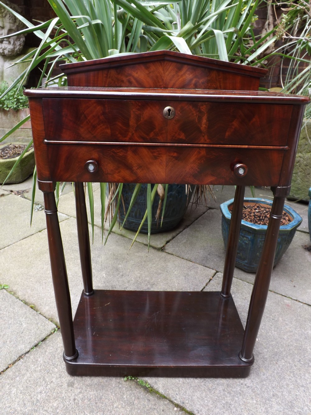 Early C19th French Restauration-period mahogany 'table-en-chiffoniere'.