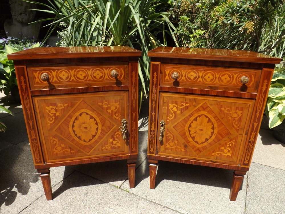 Pair of early C20th Northern Italian inlaid walnut bedside cupboards in the late C18th style of the Lombardy region.