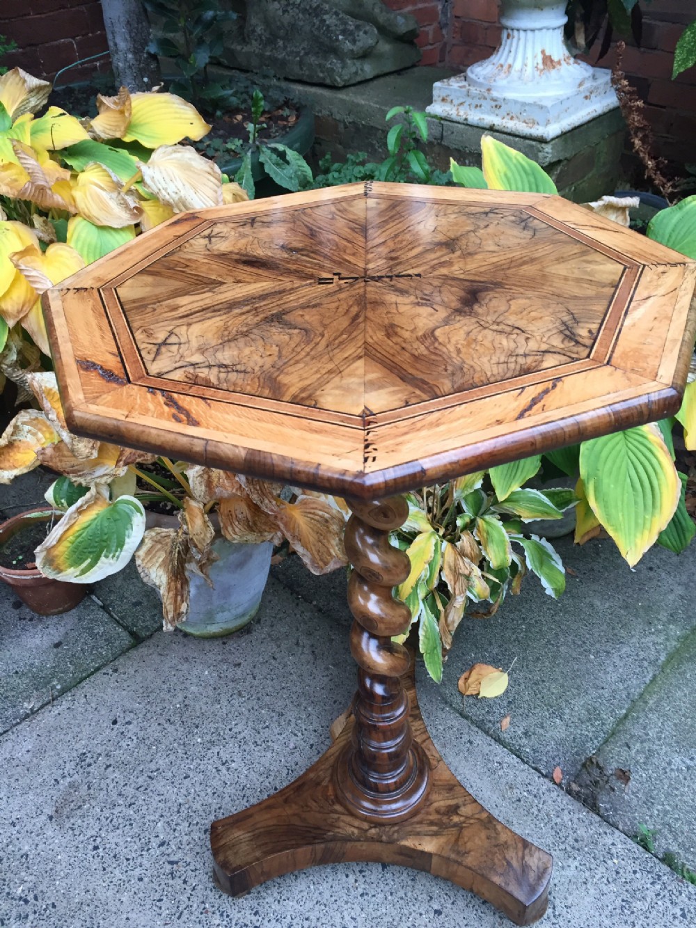 Rare C19th olive-wood pedestal table from the Holy Land with Hebrew ink inscriptions.