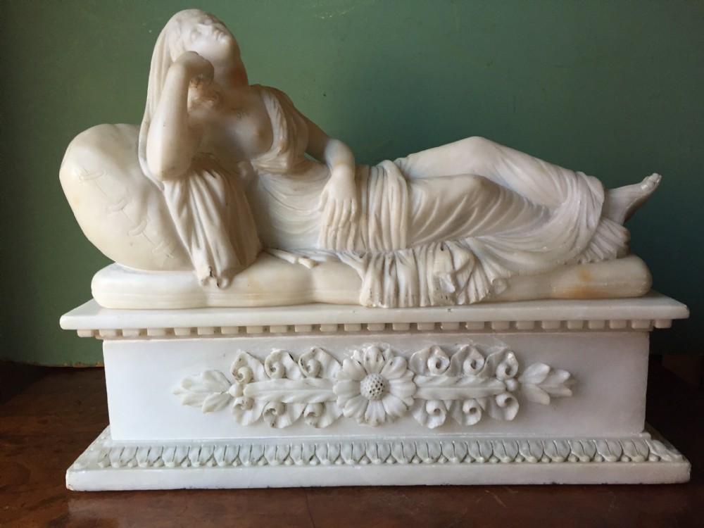 Fine C19th carved alabaster sculpture study after the antique of Lucretia , modelled as a sleeping Ariadne .