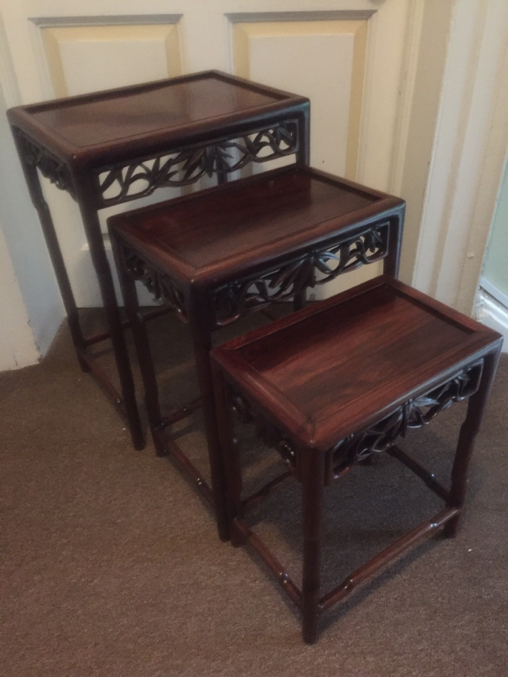 Set of 3 late C19th Chinese Qing Dynasty graduated or 'nesting' hardwood tables.