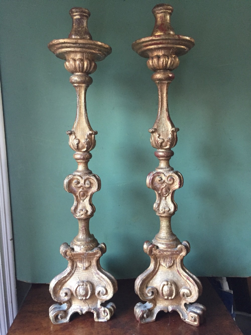 Pair of C19th Italian carved gilt-wood candlesticks.