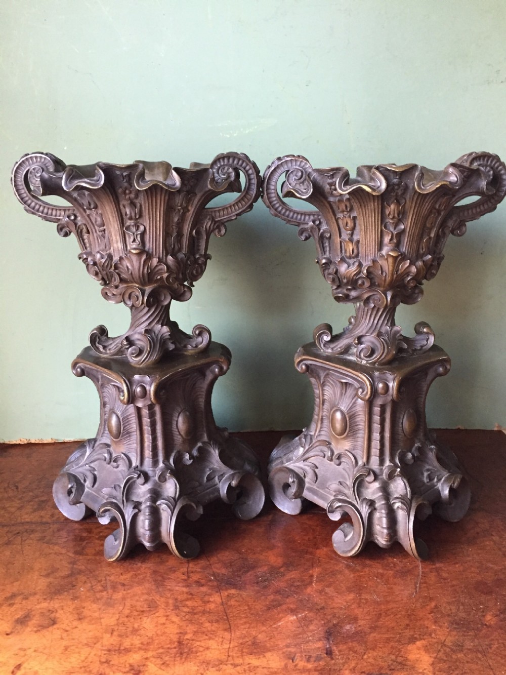 Pair of C19th French bronze rococo-style urns of Louis XV design.