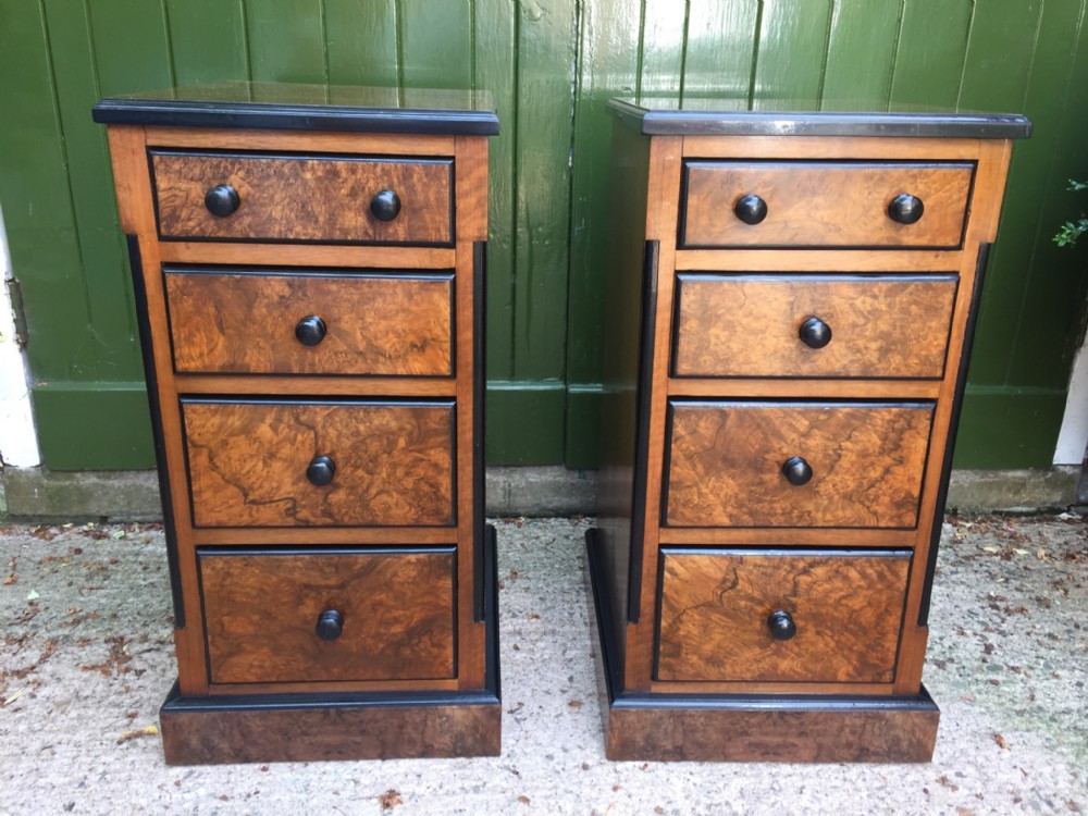 Pair of C19th French walnut and burr-walnut bedside chests-of-drawers with ebonised details.