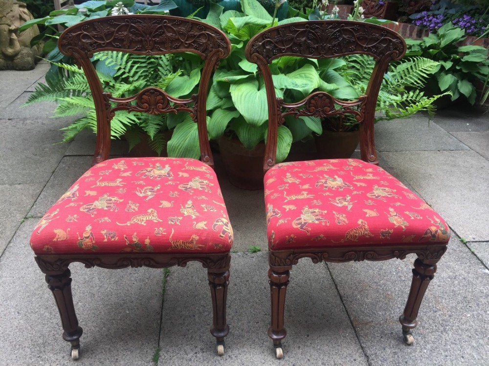 Pair of early C19th Anglo-Indian carved teak side chairs.