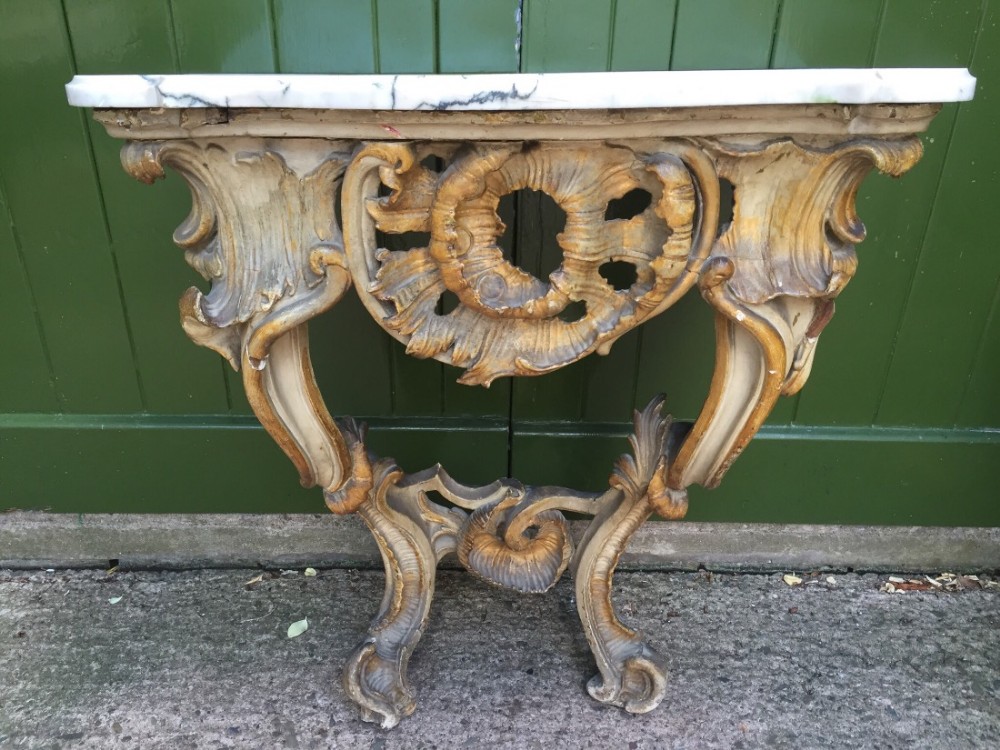 Late C18th Italian marble-topped carved gilt-wood and decorated rococo-style console table.