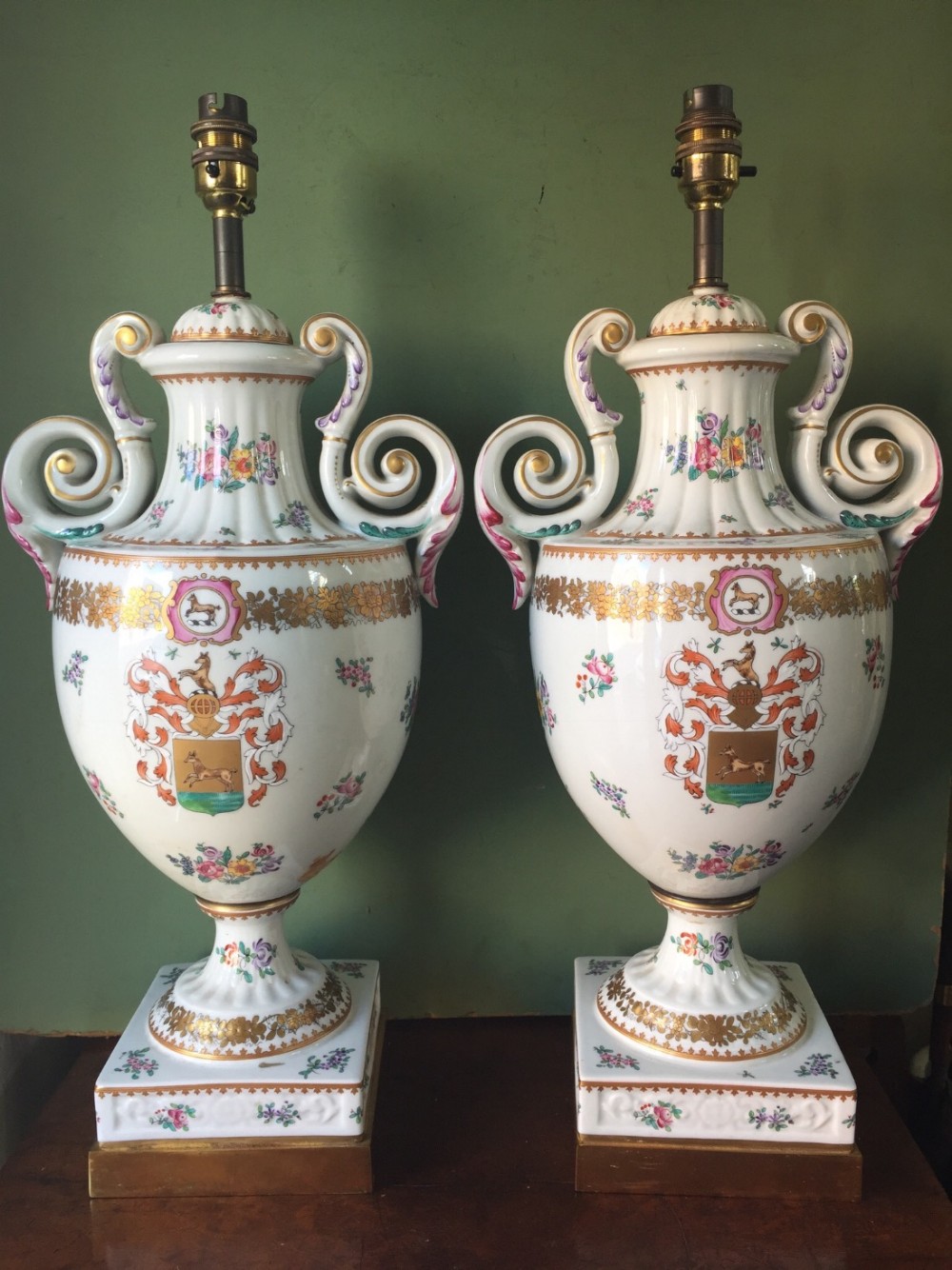 Large pair of early C20th Chinese armorial style porcelain lamps , probably by Samson of Paris .