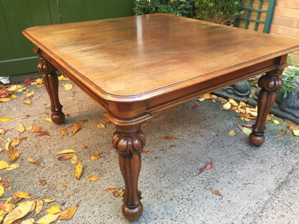 Early C19th George IV period 'pull-out' action extending mahogany dining table with 3 original extra leaves .