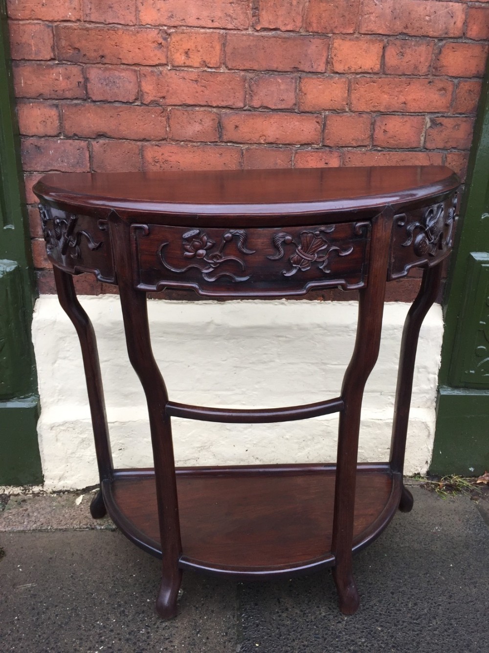 Late C19th Chinese Qing Dynasty carved hardwood demi-lune console or hall table.