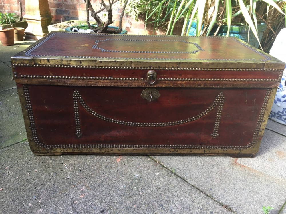 Early C19th Chinese export brass-bound and studded burgundy leather-covered camphor trunk .