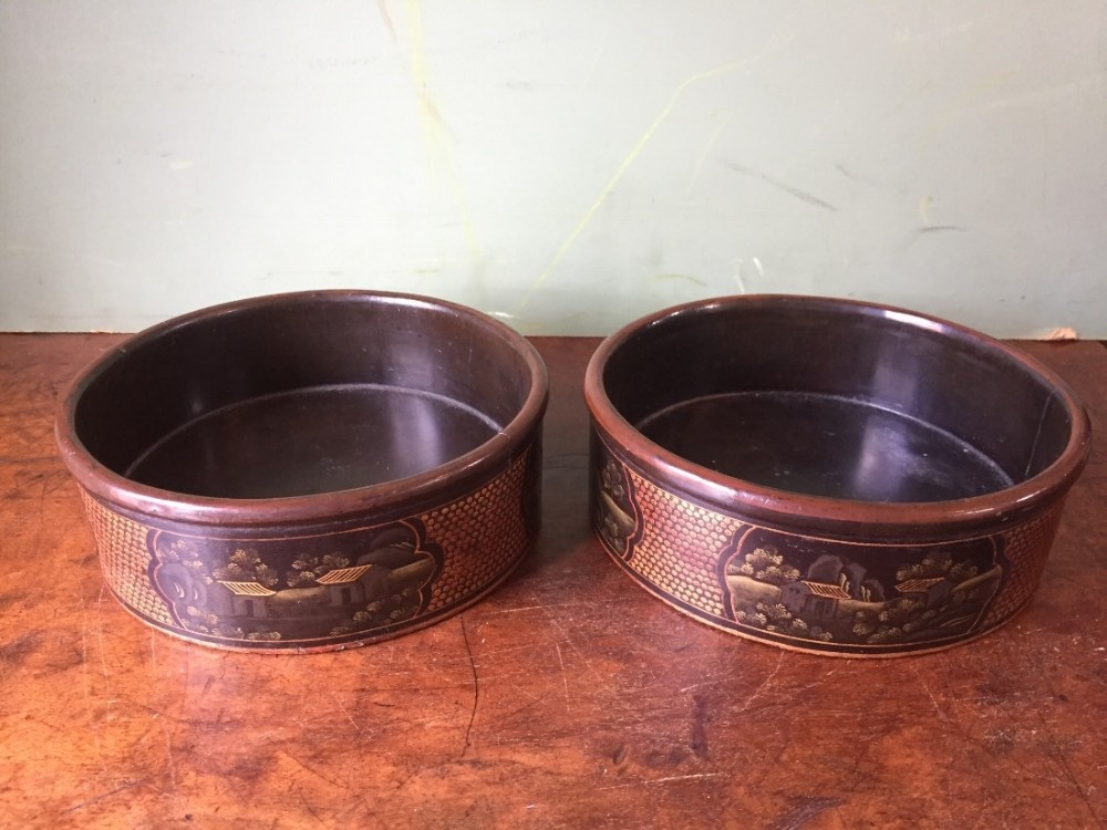 Pair of early C19th Chinese Export lacquer wine-bottle coasters.
