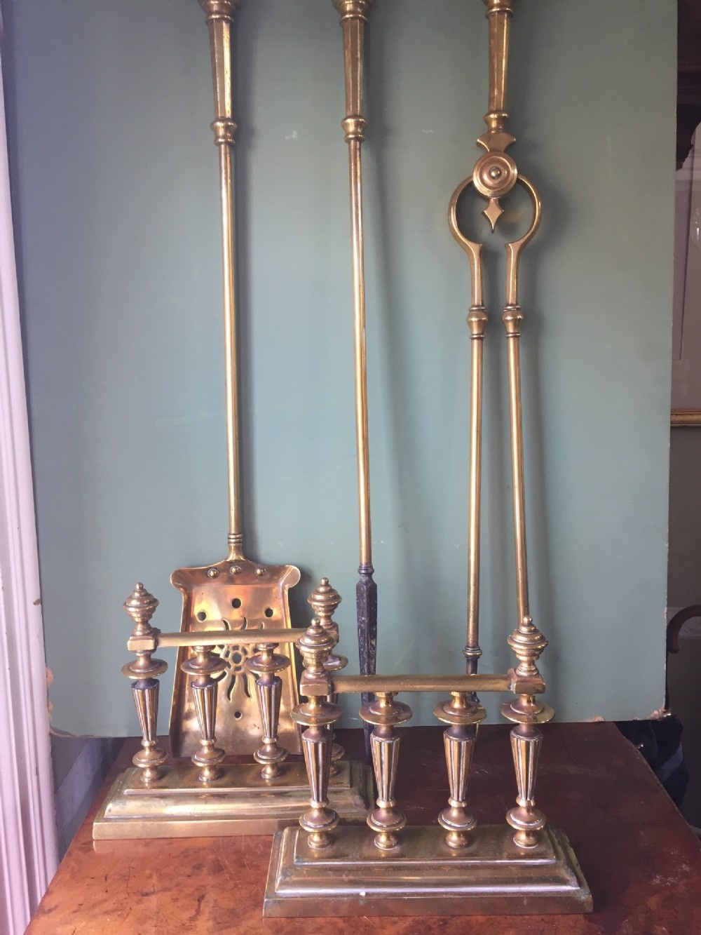 Set of 3 late C19th brass fire-irons or fire-side tools ,together with a pair of hearth-rests .
