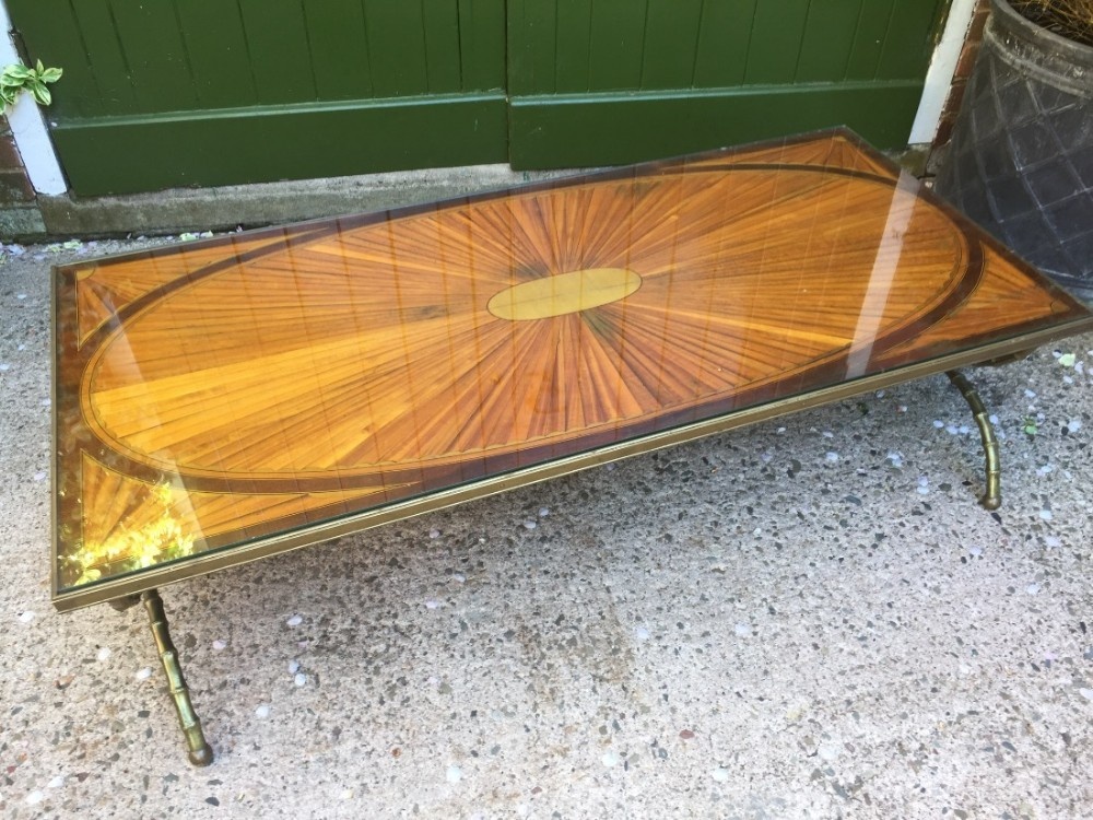 Early C20th brass-framed inlaid marquetry top coffee table on 'faux' bamboo style base.