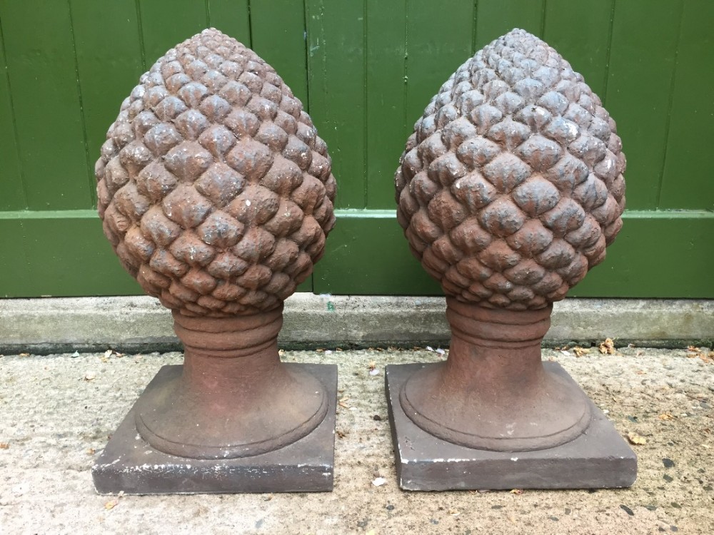 Large pair of decorative late C19th cast stone-ware or terracotta finials modelled as pine cones or acanthus flower buds.