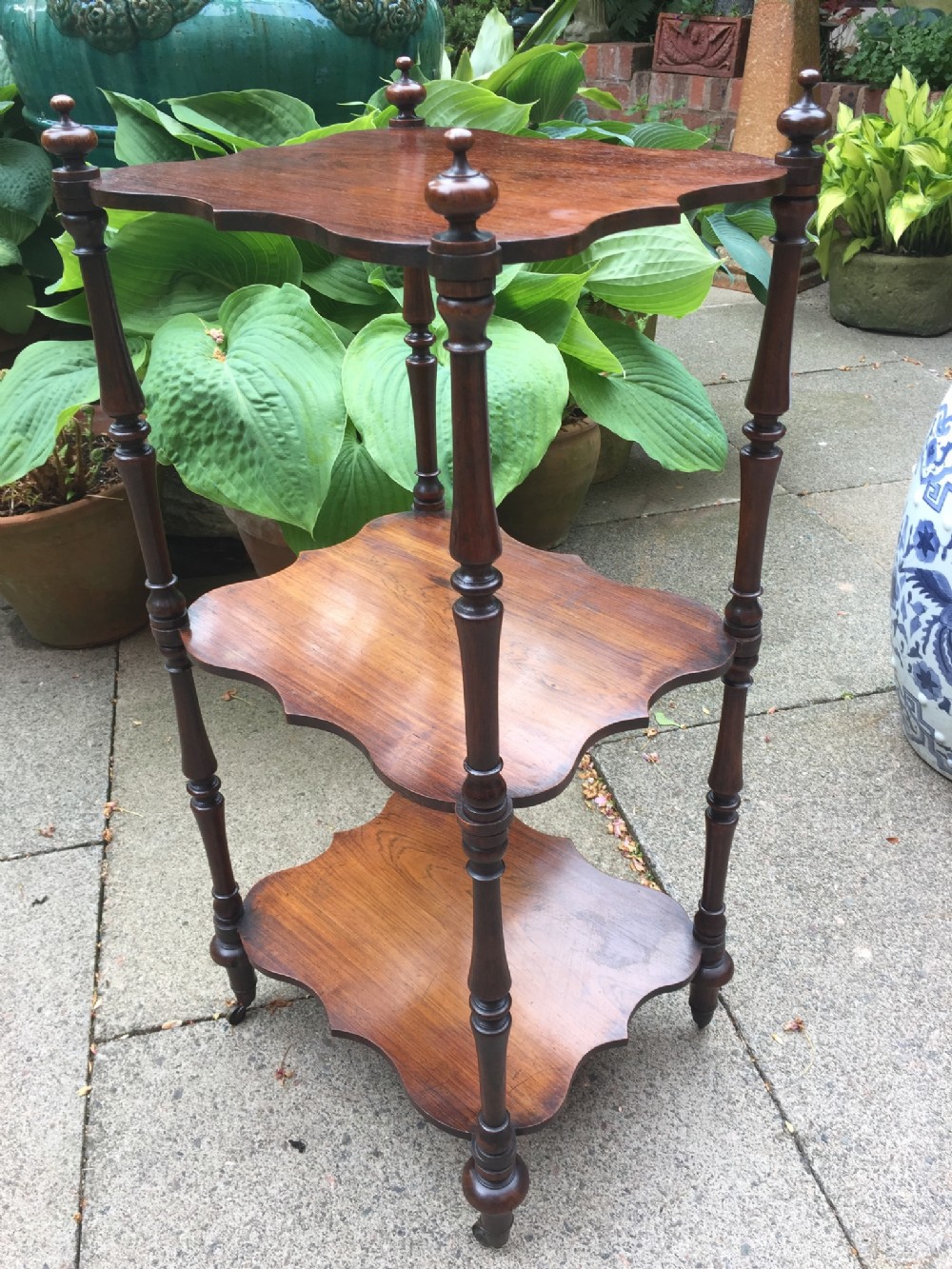 Mid C19th rosewood 3-tier etagere of neat scale and proportions.