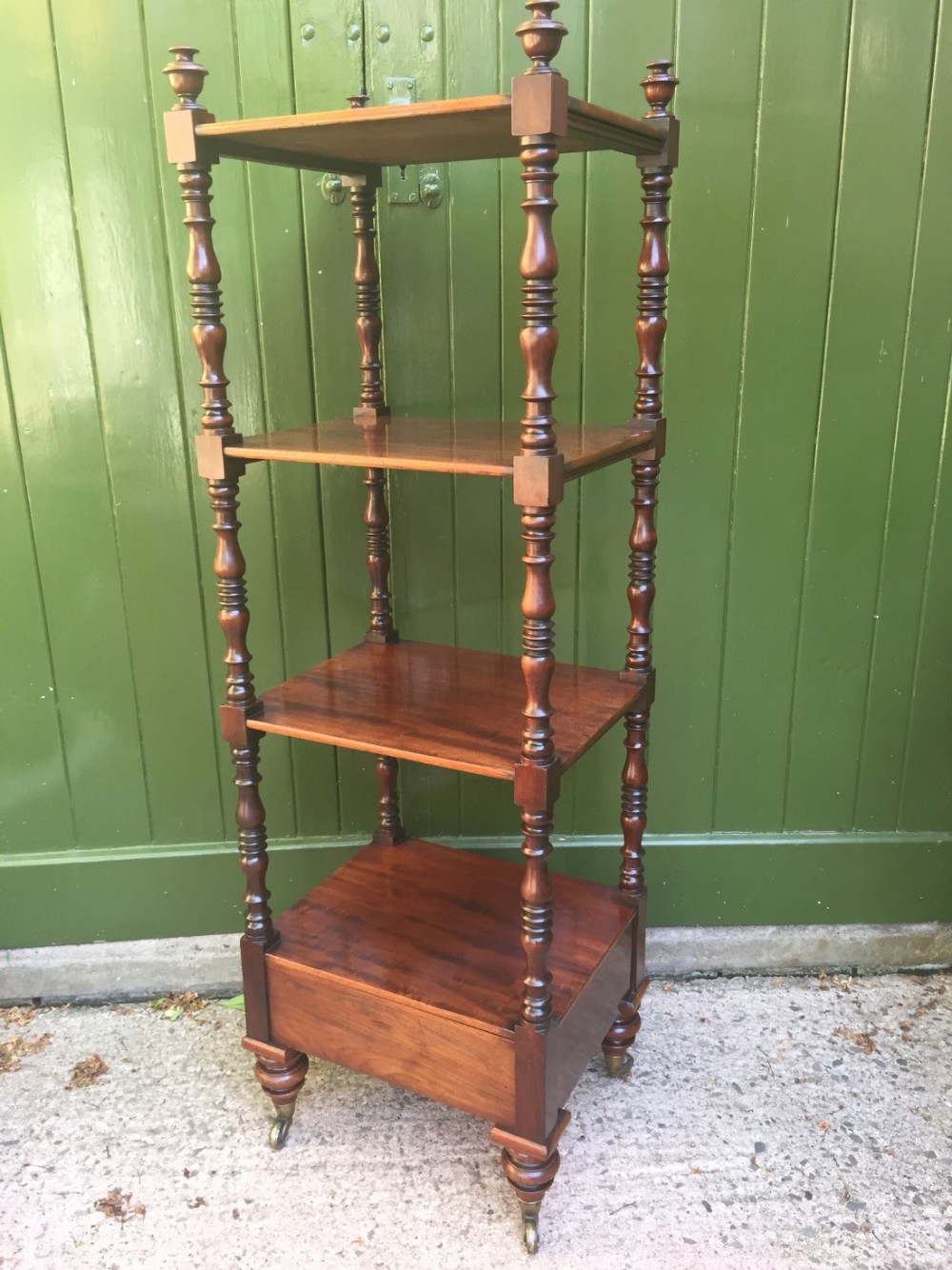 Early C19th late George III period mahogany 4-tier etagere.