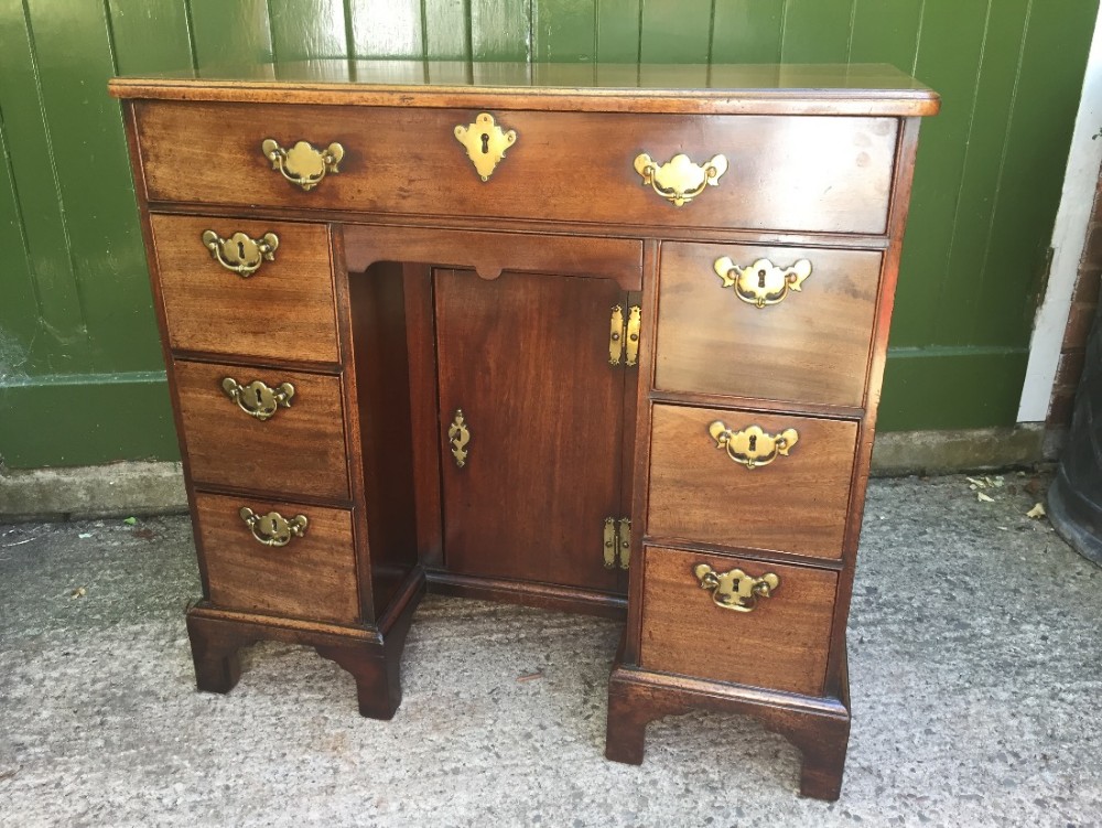 Mid C18th George II period mahogany knee-hole desk or dressing table in excellent original condition.