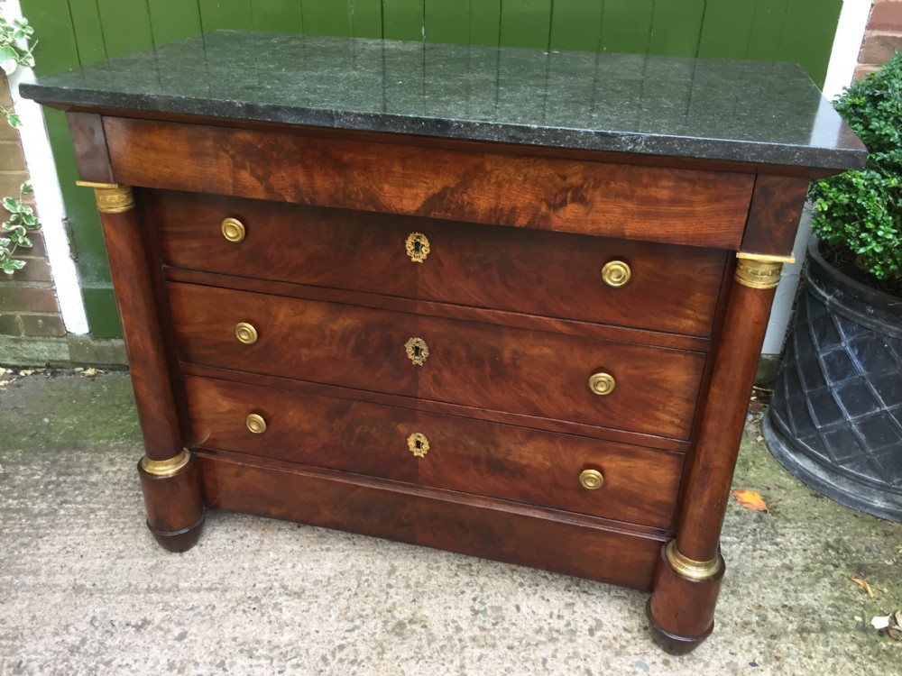 Fine quality early C19th French Empire ormolu-mounted mahogany commode with fossilised Belgian marble top.