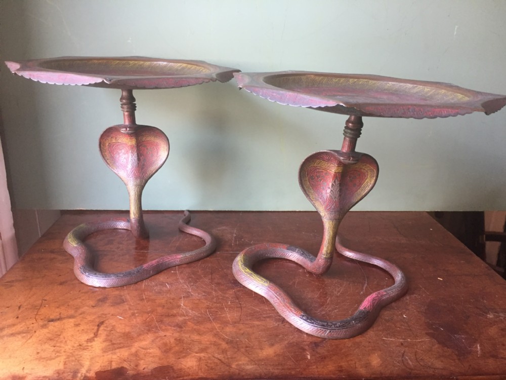 Pair of late C19th Indian decorated brass tazzas on stylised coiled cobra supports.