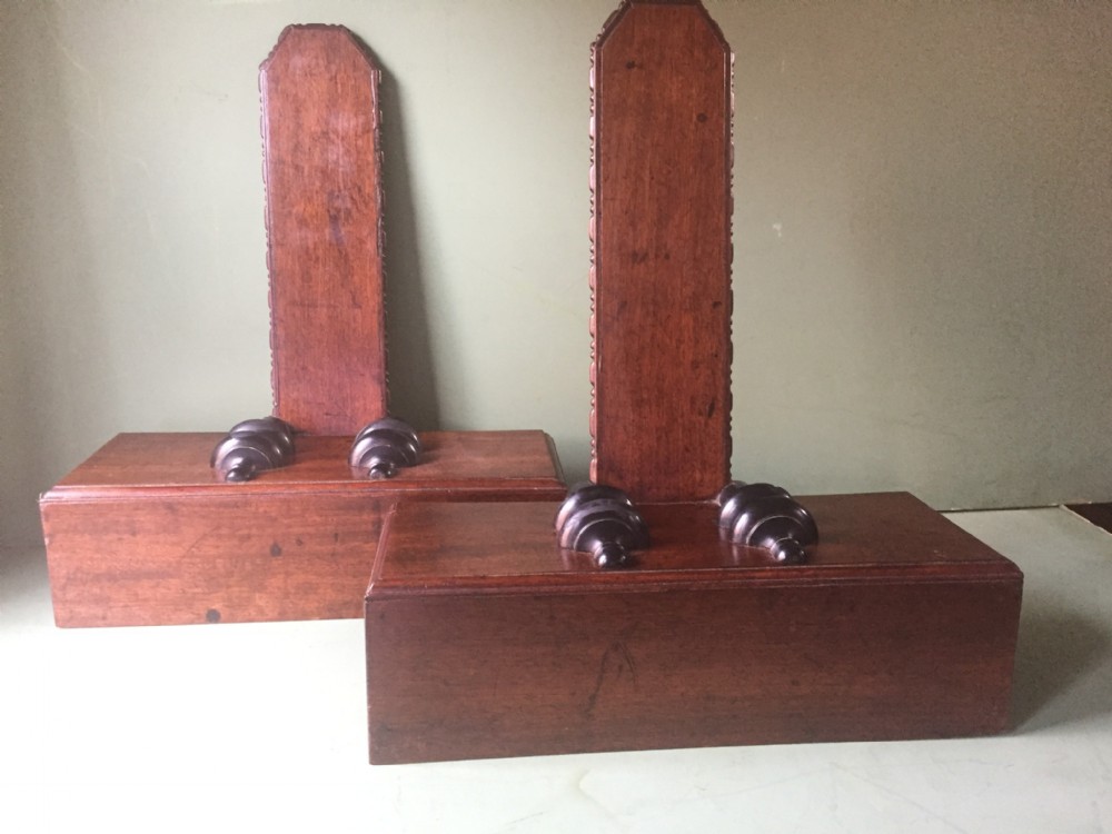 Pair of early C19th George IV period mahogany salver or charger display stands.