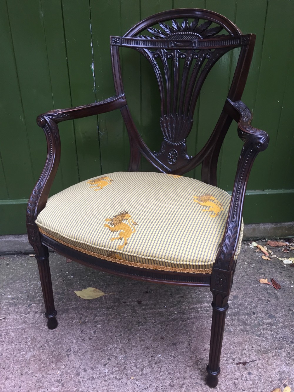 Superb quality late C19th carved mahogany framed armchair in the Adam revival style.