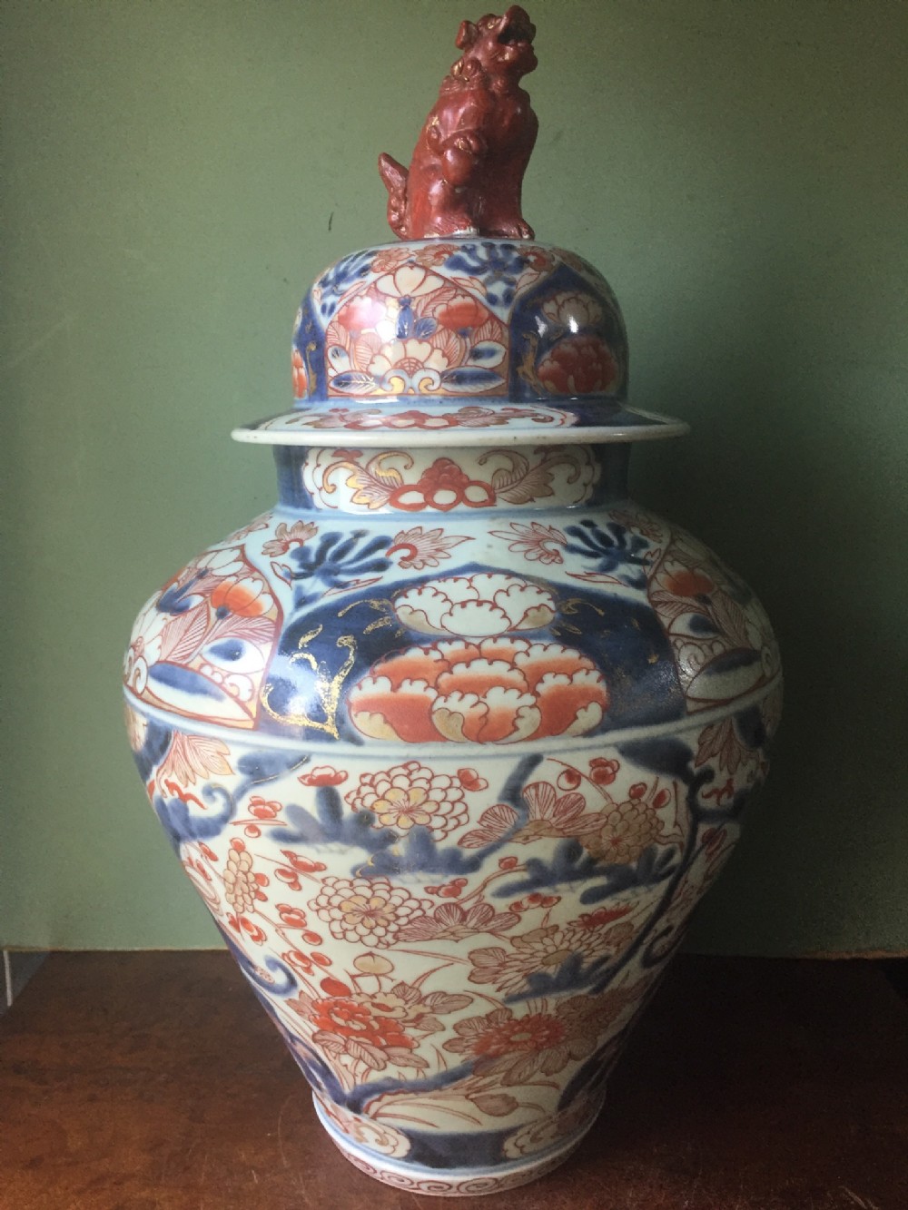 C18th Japanese porcelain vase and cover decorated in the Imari palette.