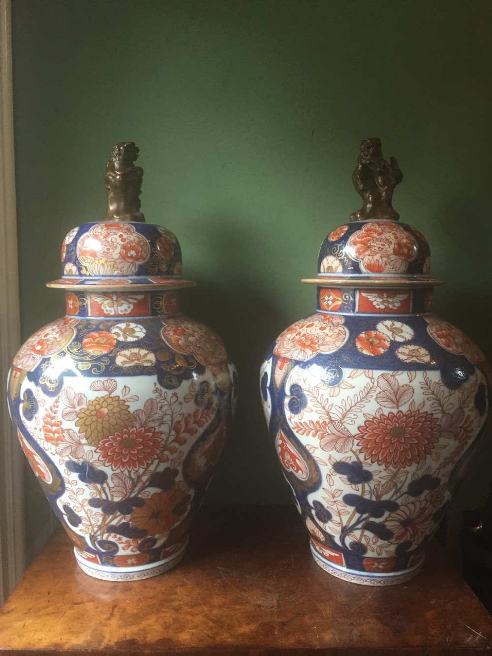 Fine pair of C18th Japanese Imari pattern porcelain vases and covers.