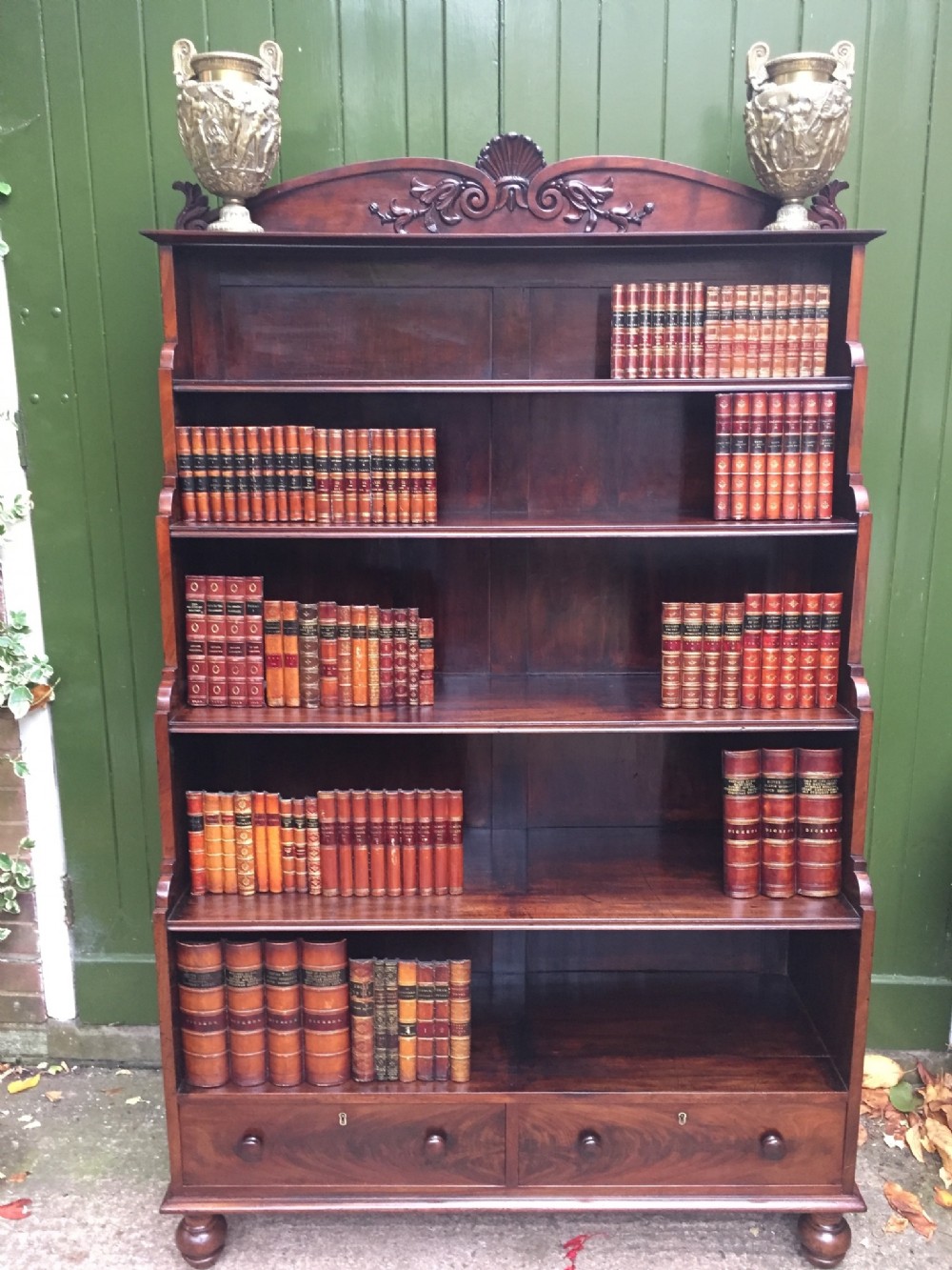 Early C19th George IV period mahogany open bookcase of graduated 'waterfall ' design.