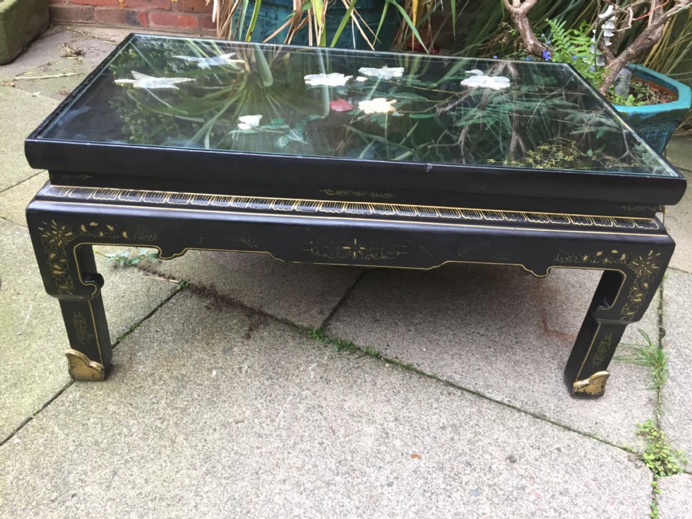 Early C20th Chinese lacquer coffee or reception room table with decorated carved 'soapstone' relief panel top .