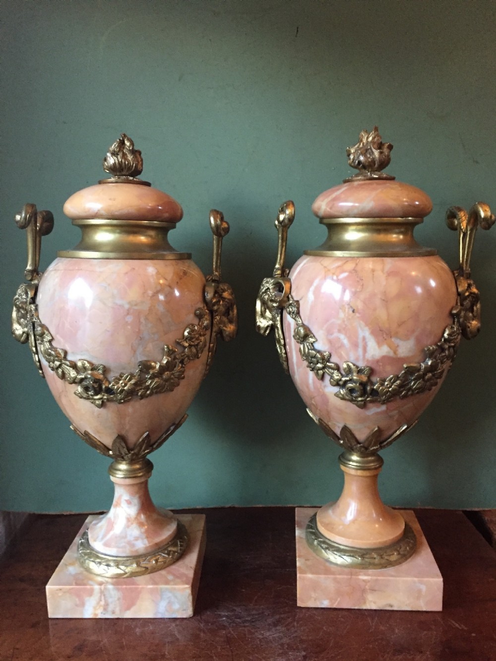 Pair of early C20th French Louis XVI style ormolu-mounted marble urns.