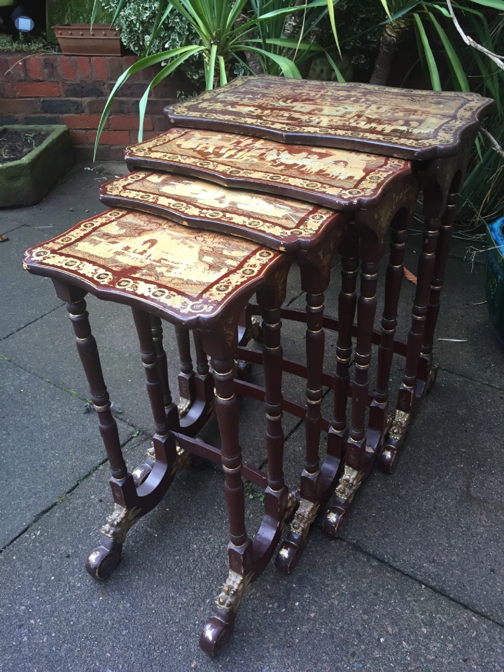 C19th quartetto of Chinese Export lacquer tables with gilded decoration.