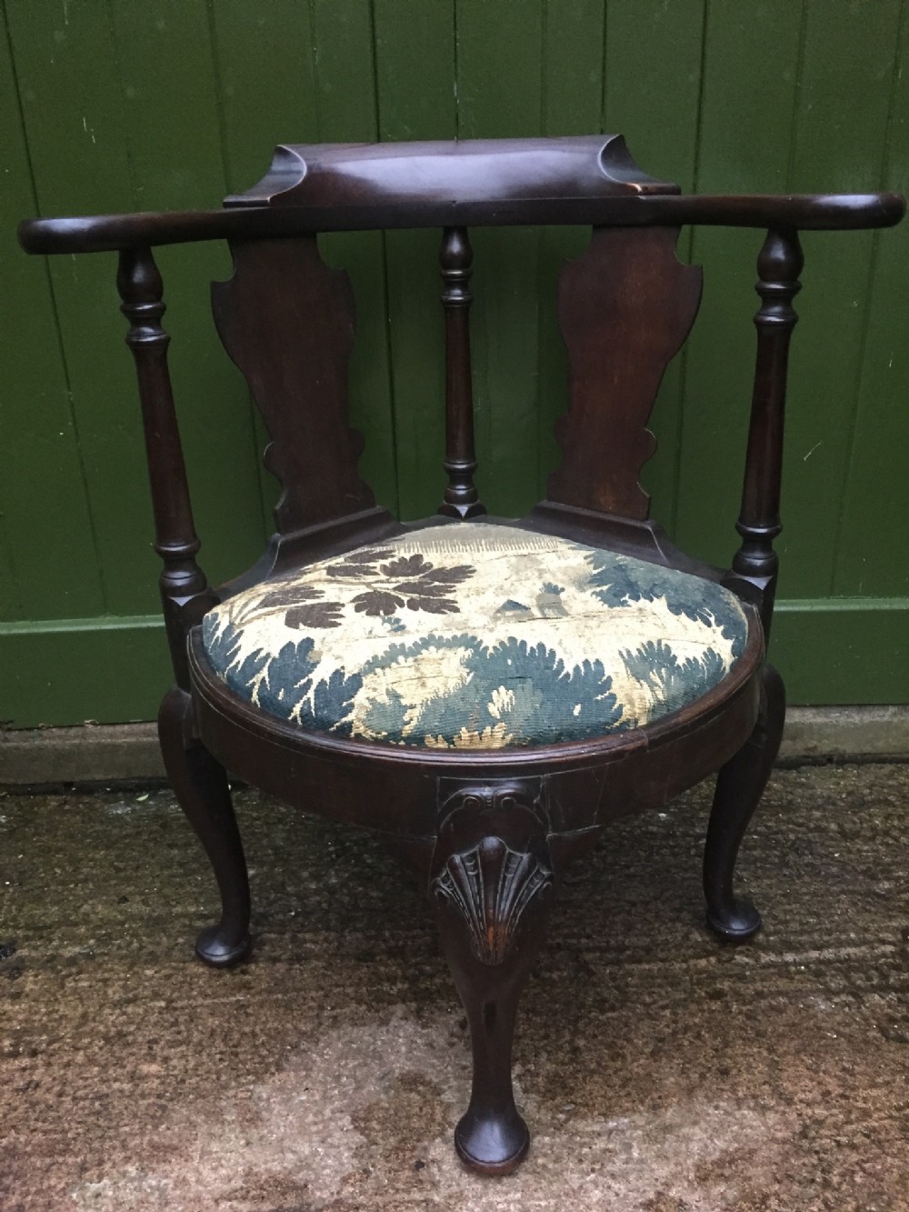 Mid C18th George II period mahogany corner or reading armchair.