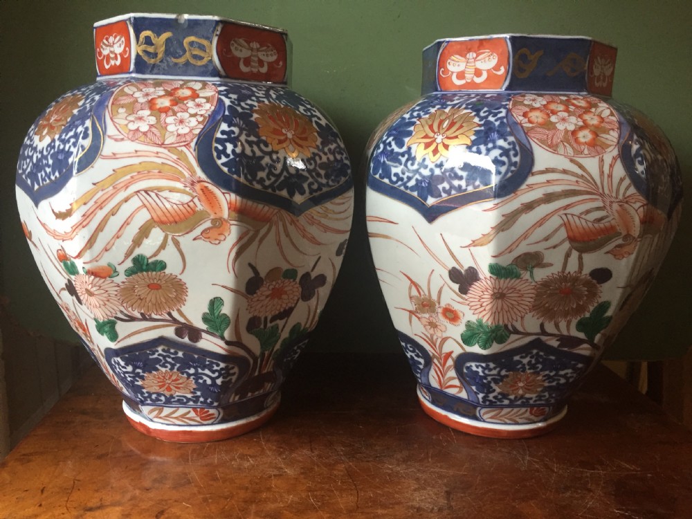 Pair of C18th Japanese Imari palette porcelain vases . View II